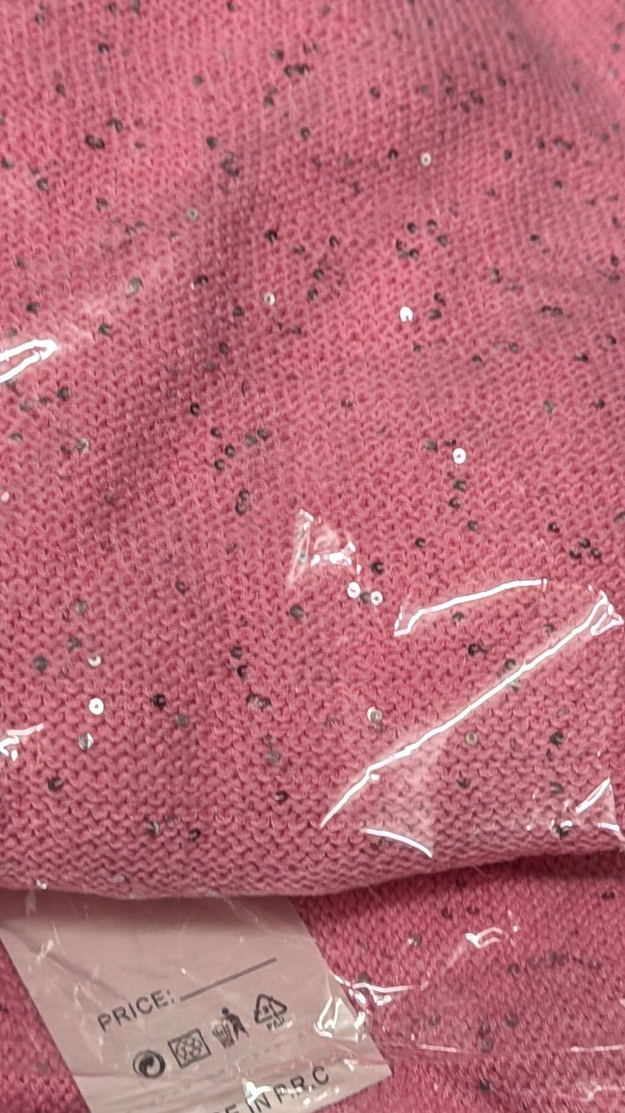 Roze trui met detail