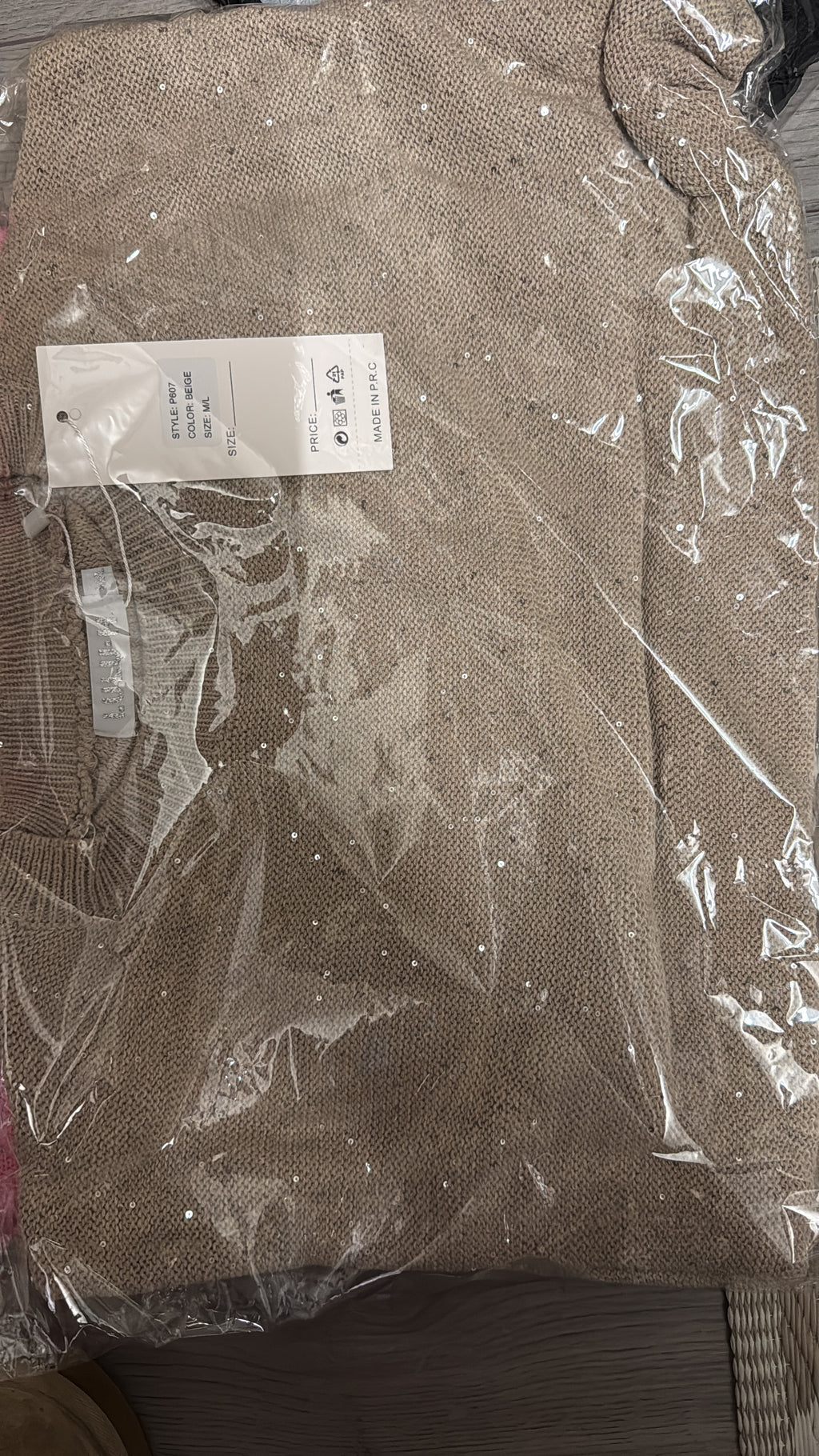 Beige trui met detail