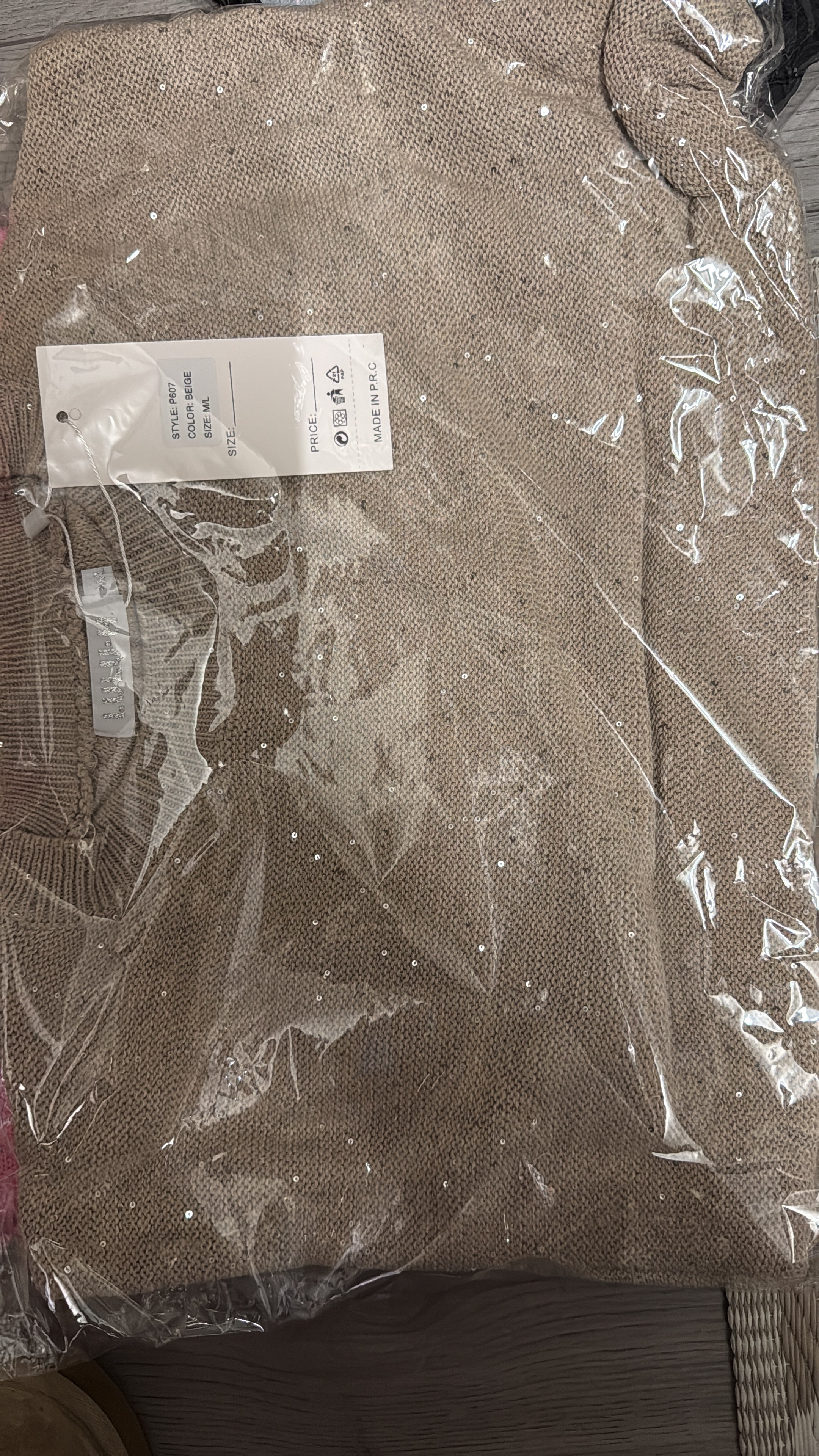 Beige trui met detail